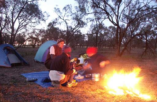 Tim, Vino and Dan by the camp fire